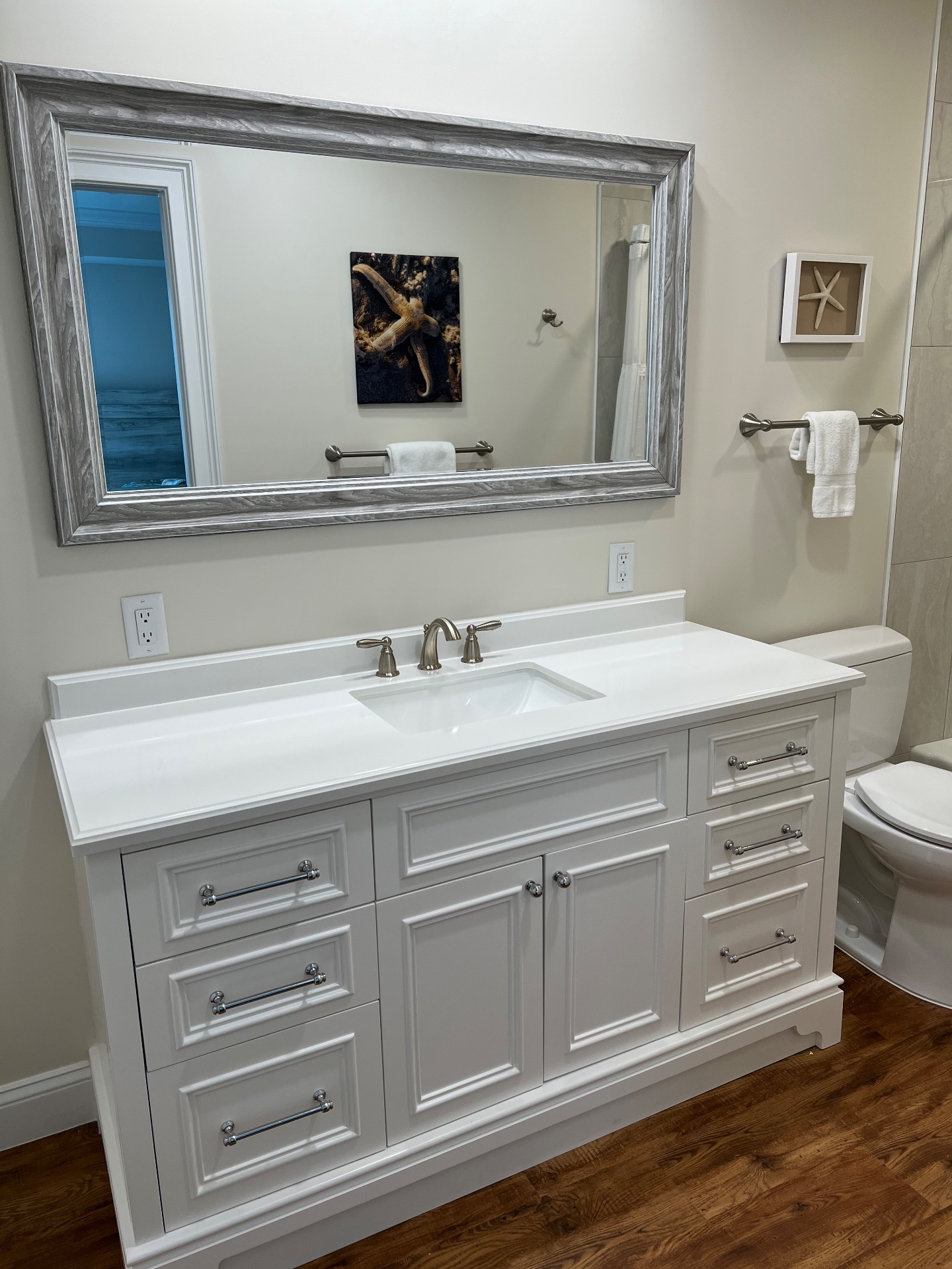 Newly renovated bathroom with 60" vanity in second bedroom 