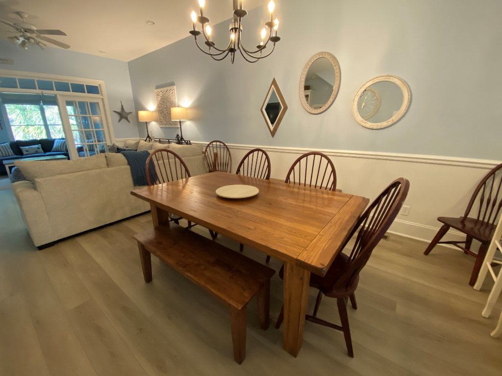 Dining table with expandable seating for 12