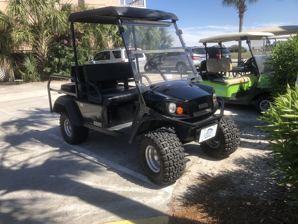 4 seater golf cart included in price