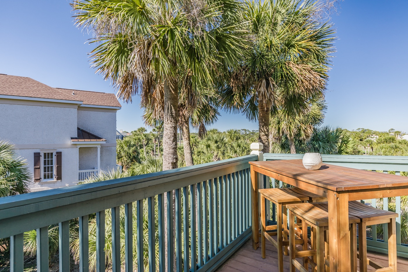 Enjoy cocktails or meals on the spacious deck with views of the ocean or golf course