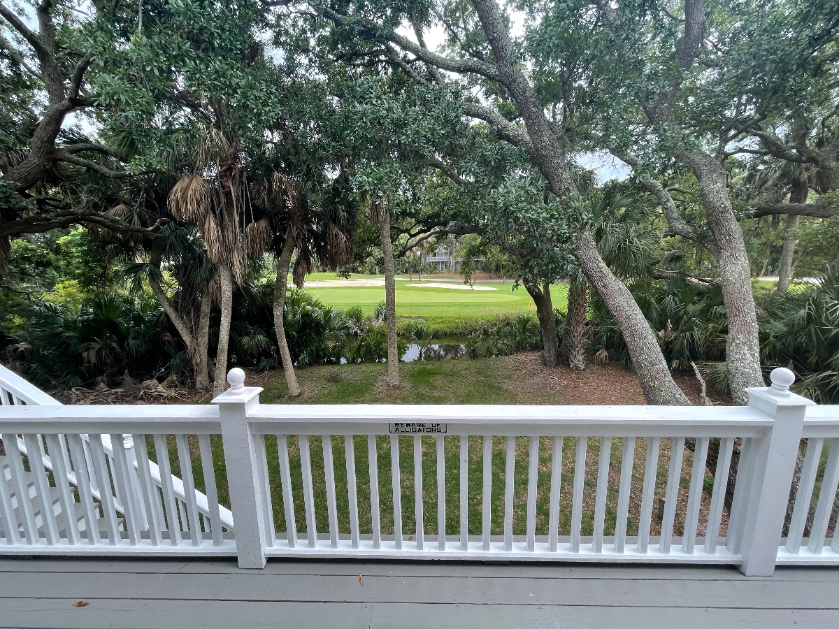 Looking from the back deck to the lagoon and the 6th green