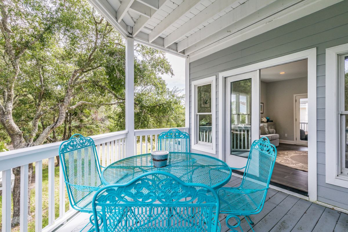Outdoor dining on covered back porch