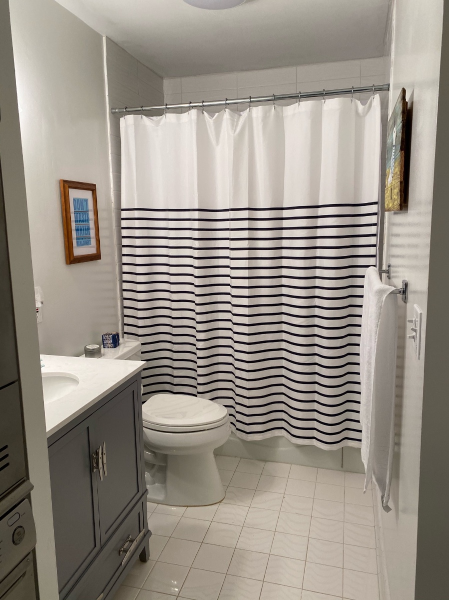 Full bathroom accessible from second bedroom and hall