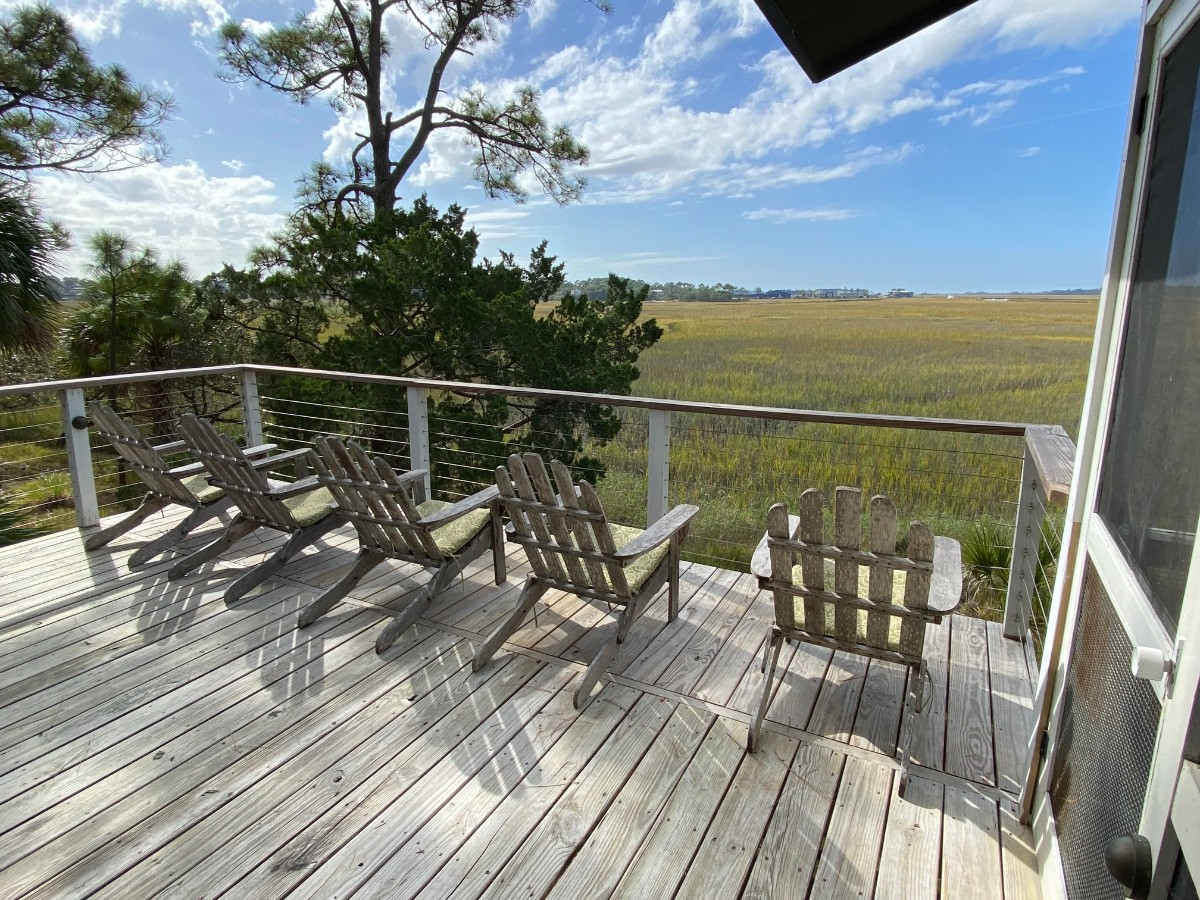Sun deck with 5 adirondack chairs and spectacular views