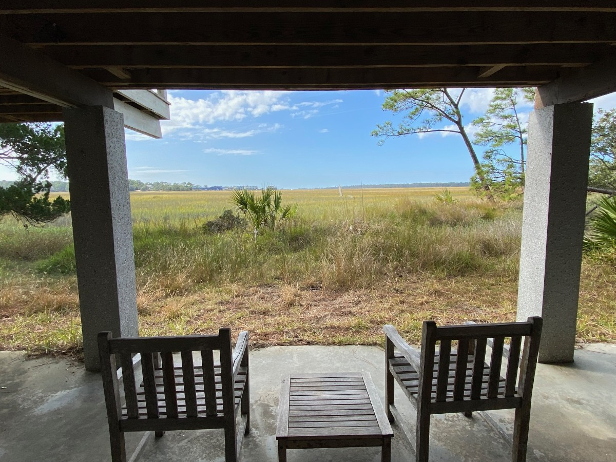 Patio area with marsh views, access to crabbing and fishing dock, fish cleaning station