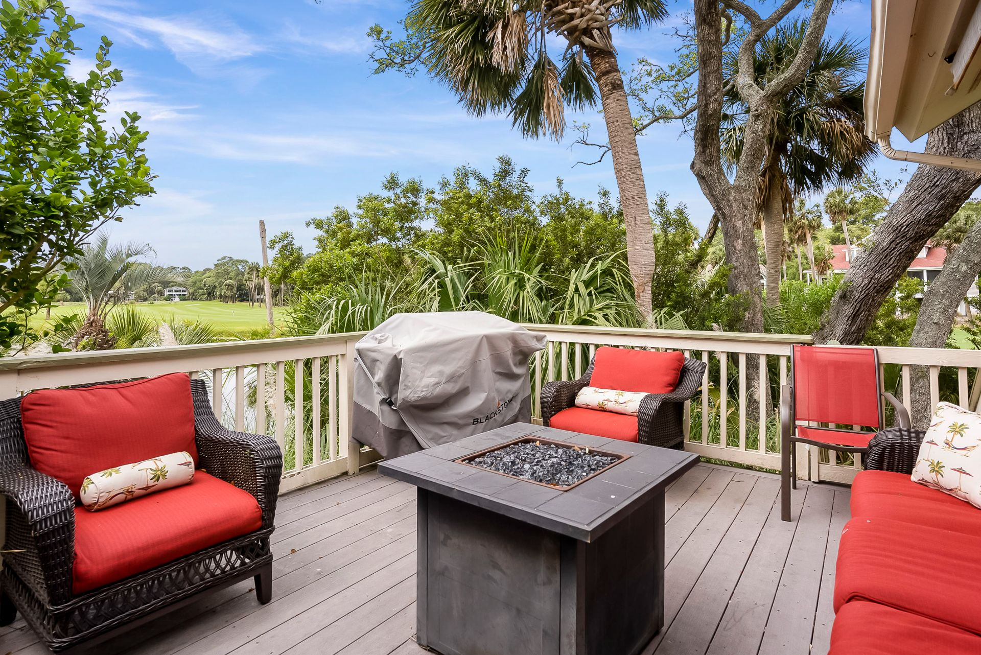 Outdoor patio with Blackstone Gas Grill and golf course views 