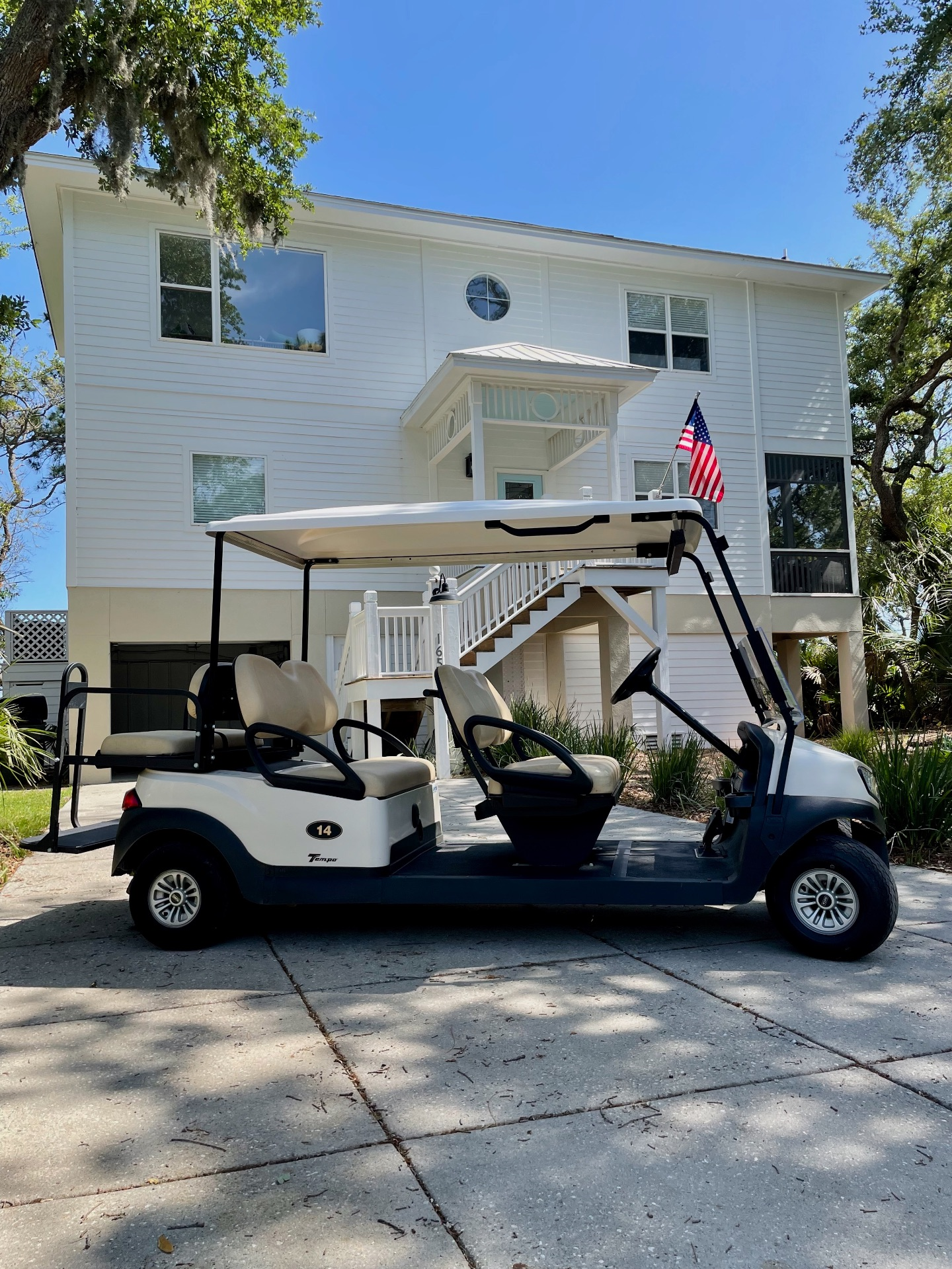 Six seat limo golf cart included with the rental.
