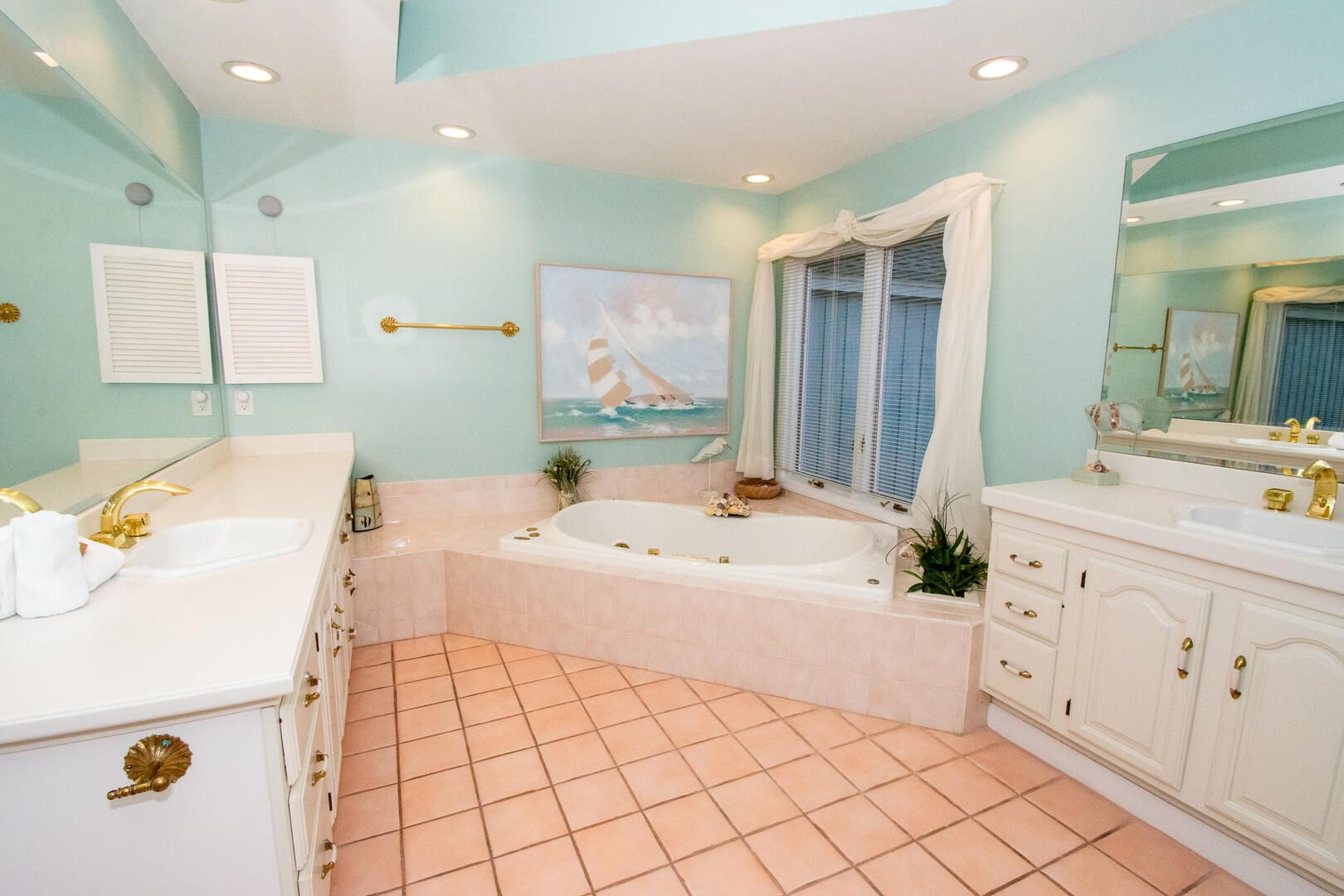 large bath with double vanities, 
soaking tub, and walk-in shower